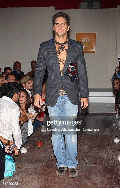 Arap Bethke walks the runway at Pearl nightclub during the Rocco Donna 2 year anniversary party on June 15, 2006 in Miami Beach, Florida.