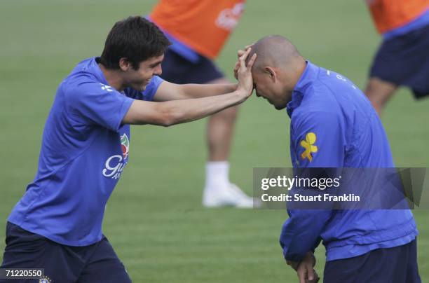 Kaka of Brazil pushes Ronaldo of Brazil on his head during the training session and press conference of the Brazilian National Team for the FIFA...