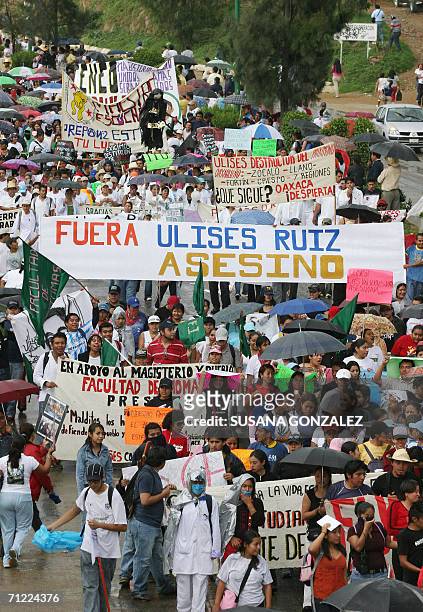 Thousands of teachers of the Mexican state of Oaxaca march along a highway to the center of the city on June 16th, 2006. At dawn on Wednesday some...