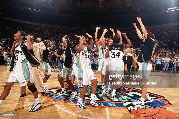 The New York Liberty celebrate a big win after a WNBA game in 2000 at Madison Square Garden in New York, New York. NOTE TO USER: User expressly...