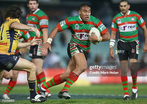 Manase Manuokafoa of the Rabbitohs takes on the Eels defence during the round 15 NRL match between the Parramatta Eels and the South Sydney Rabbitohs...