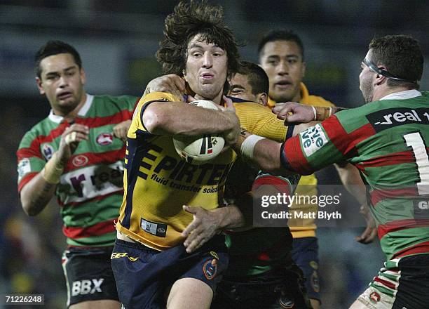 Nathan Hindmarsh of the Eels is tackled during the round 15 NRL match between the Parramatta Eels and the South Sydney Rabbitohs at Parramatta...