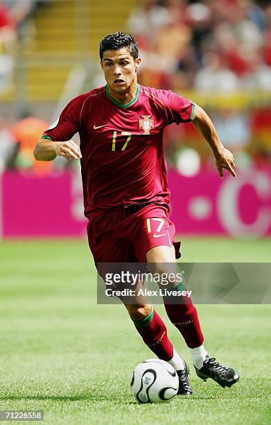 Cristiano Ronaldo of Portugal runs with the ball during the FIFA World Cup Germany 2006 Group D match between Portugal and Iran played at the Stadium...