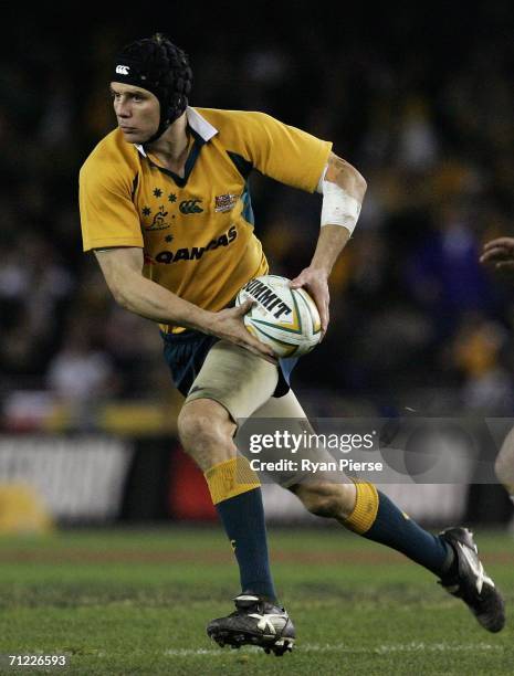 Stephen Larkham of the Wallabies in action during the Second Cook Cup match between the Australian Wallabies and England at the Telstra Dome on June...