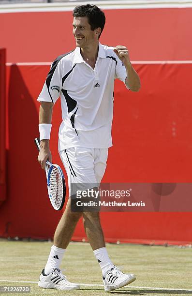 Tim Henman of Great Britain celebrates a point against Lleyton Hewitt of Australia during Day 6 of the Stella Artois Championships at Queen's Club on...