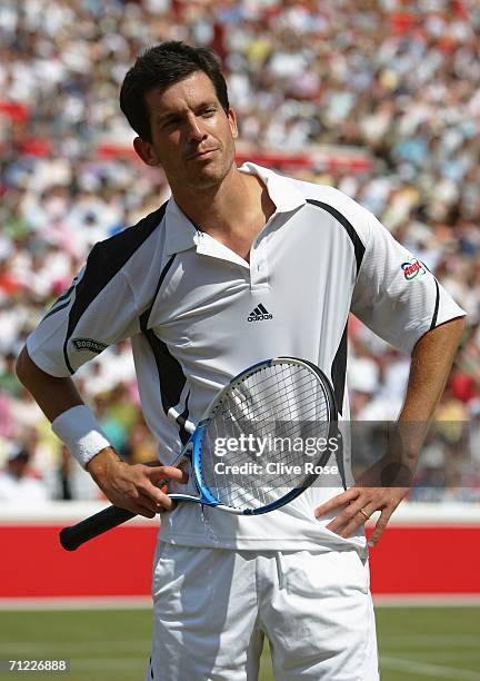 Tim Henman of Great Britain looks dejected against Lleyton Hewitt of Australia during Day 6 of the Stella Artois Championships at Queen's Club on...