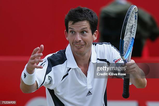 Tim Henman of Great Britain gestures to the crowd against Lleyton Hewitt of Australia during Day 6 of the Stella Artois Championships at Queen's Club...