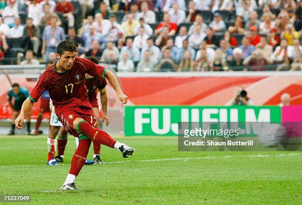 Cristiano Ronaldo of Portugal scores his team's second goal from the penalty spot during the FIFA World Cup Germany 2006 Group D match between...