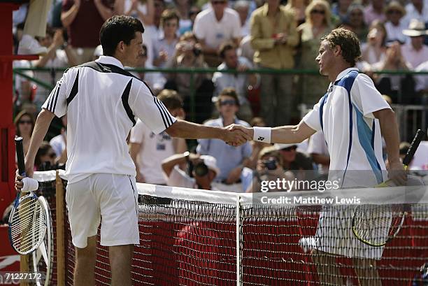 Tim Henman of Great Britain congratulates Lleyton Hewitt of Australia during Day 6 of the Stella Artois Championships at Queen's Club on June 17,...