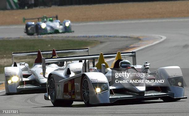 The two diesel AUDI R10 driven by Scot Allan McNish and German Frank Biela lead the race after the start of the Le Mans 24-hours race, 17 June 2006...