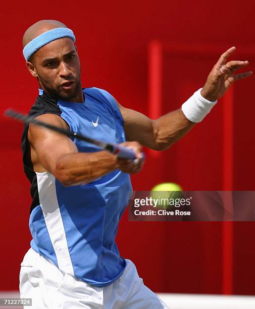 James Blake of the United States in action against Andy Roddick of the United States during Day 6 of the Stella Artois Championships at Queen's Club...