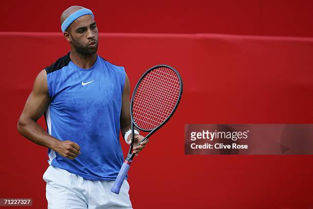 James Blake of the United States looks on against Andy Roddick of the United States during Day 6 of the Stella Artois Championships at Queen's Club...