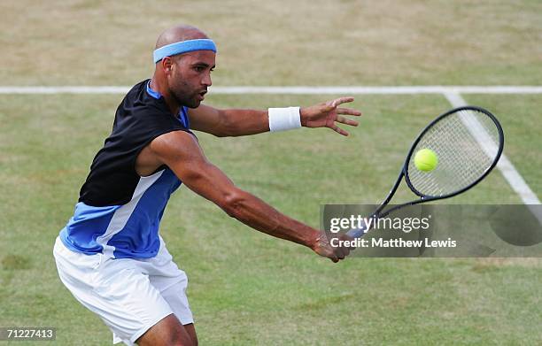 James Blake of the United States in action against Andy Roddick of the United States during Day 6 of the Stella Artois Championships at Queen's Club...