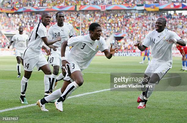 Asamoah Gyan of Ghana celebrates scoring the first goal of the game during the FIFA World Cup Germany 2006 Group E match between Czech Republic and...