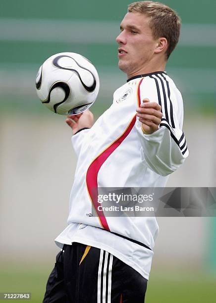 Lukas Podolski stopps the ball during a German National Football Team training session on June 17, 2006 in Berlin, Germany.