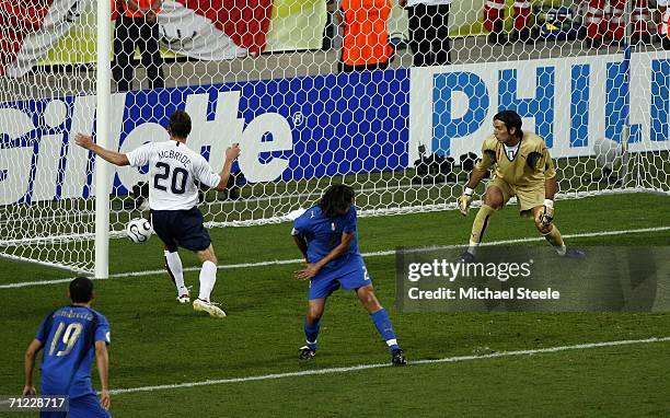 The ball deflects off Cristian Zaccardo of Italy and into the net for an own goal during the FIFA World Cup Germany 2006 Group E match between Italy...