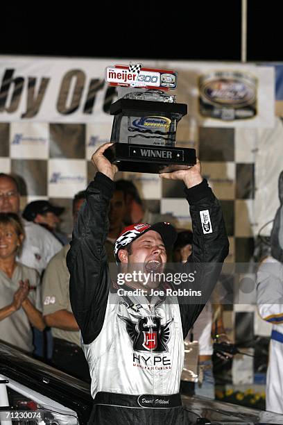 David Gilliland celebrates after driving the Hype Manufacturing Chevrolet to victory in the NASCAR Busch Series Meijer 300 on June 17, 2006 at the...