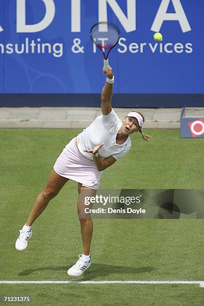 Alicia Molik of Australia serves to Ana Ivanovic of Serbia and Montenegro during an Ordina Open first round tennis match on June 18, 2006 in...