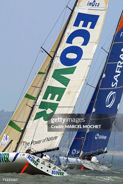 Saint-Nazaire, FRANCE: British Micke Golding's monohull Ecover , and French Marc Guillemot 60 feet monohull "Safran" take the start of the SNSM...