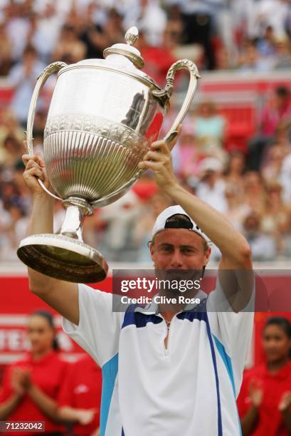 Lleyton Hewitt of Australia celebrates victory with the trophy against James Blake of the United States during the Singles Final on Day 7 of the...