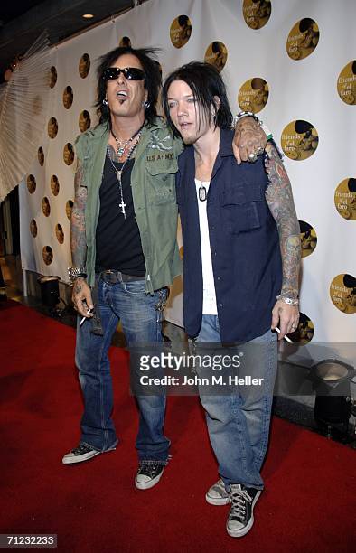 Nikki Sixx and a friend arrive at the 4th Annual Friends Of El Faro Fundraiser being held at the Music Box at the Henry Fonda Theatre on June 17,...