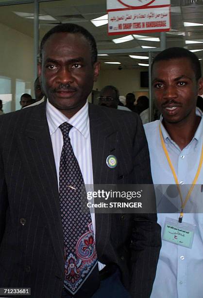 Delegation leader of the Sudan Liberation Movement , Mohamed Tigani al-Tayeb arrives at a terminal in Khartoum airport, 18 June 2006. An advance...