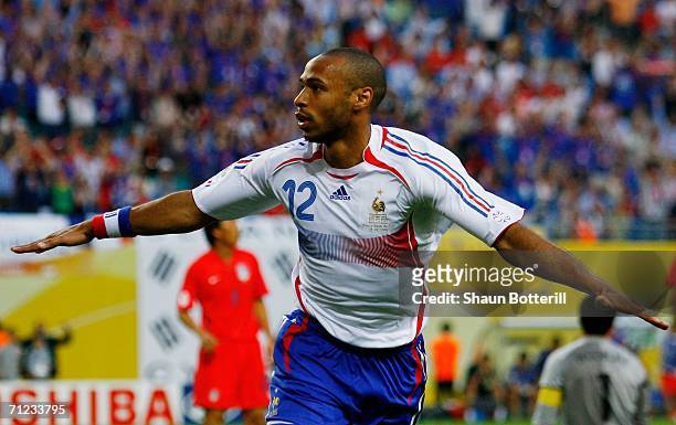 Thierry Henry of France celebrates scoring the opening goal during the FIFA World Cup Germany 2006 Group G match between France and Korea Republic...