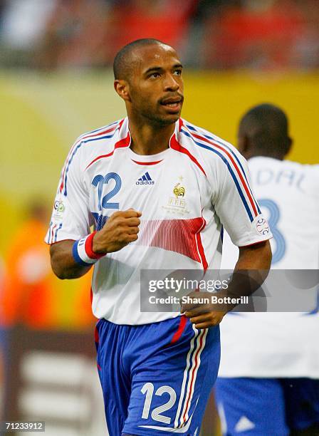 Thierry Henry of France celebrates scoring the opening goal during the FIFA World Cup Germany 2006 Group G match between France and Korea Republic...