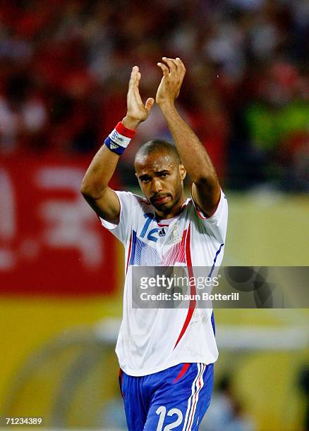 Thierry Henry of France applauds the fans as he leaves the pitch at the end of the FIFA World Cup Germany 2006 Group G match between France and Korea...