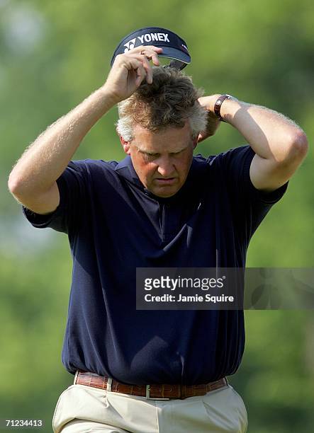 Colin Montgomerie of Scotland shows his frustration on the ninth hole during the final round of the 2006 US Open Championship at Winged Foot Golf...