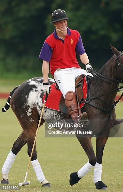 Prince Harry in action at the Beaufort Polo Club on June 18, 2006 in Tetbury, England.