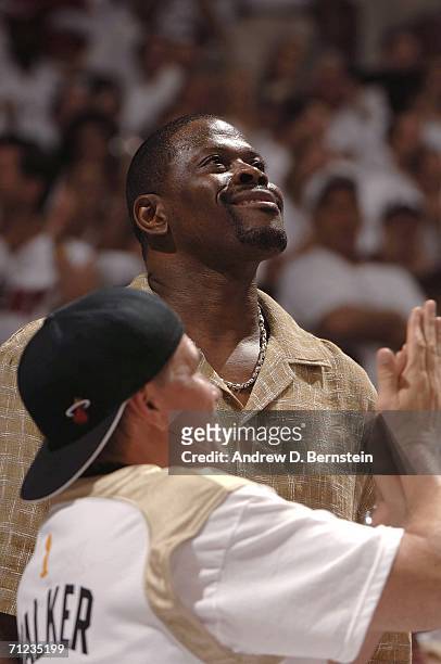 Patrick Ewing, assistant coach of the Houston Rockets, smiles during Game Five of the 2006 NBA Finals between the Miami Heat and the Dallas Mavericks...