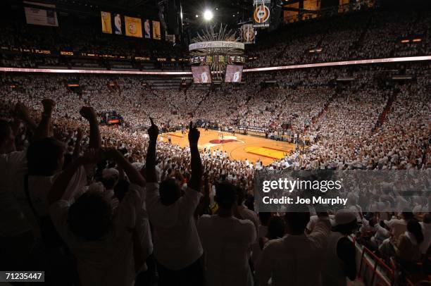 Fans of the Miami Heat stand on their feet and cheer during Game Five of the 2006 NBA Finals against the Dallas Mavericks on June 18, 2006 at the...