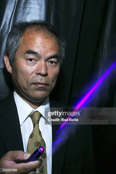 Professor Shuji Nakamura demonstrates a blue laser diode on June 18, 2006 in Santa Barbara, California. Nakamura has been awarded the 2006 Millenium...
