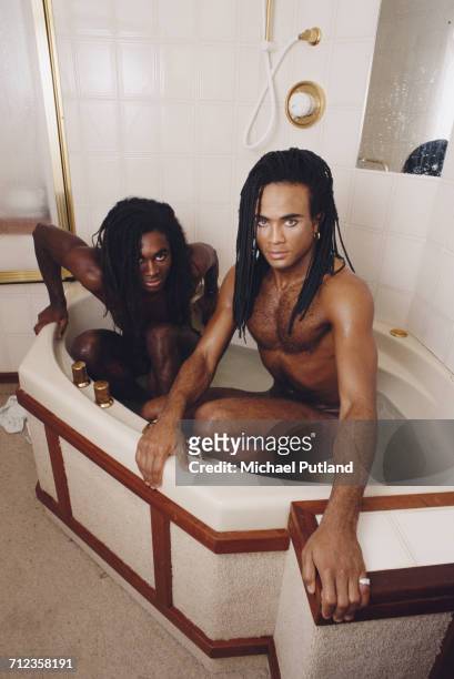 Fab Morvan and Rob Pilatus of German group Milli Vanilli pictured sharing a bath together in London on 27 September 1988.