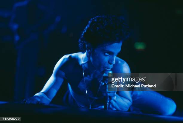 American singer-songwriter and musician, Prince performs on stage on the Hit N Run-Parade Tour at Wembley Arena, London in August 1986.