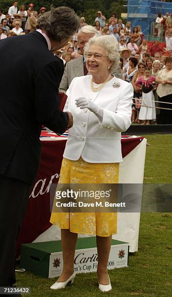 Queen Elizabeth II attends The Queen's Cup final at the Guards Polo Club on June 18, 2006 in Windsor, England. The Surrey major polo tournament,...