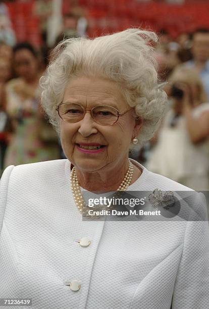 Queen Elizabeth II attends The Queen's Cup final at the Guards Polo Club on June 18, 2006 in Windsor, England. The Surrey major polo tournament,...