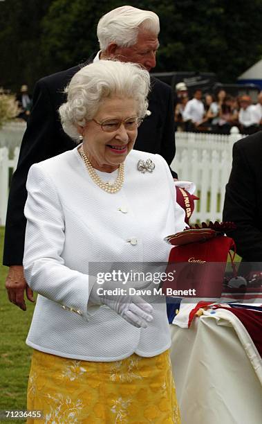 Queen Elizabeth II attends The Queen's Cup final at the Guards Polo Club on June 18, 2006 in Windsor, England. The Surrey major polo tournament,...