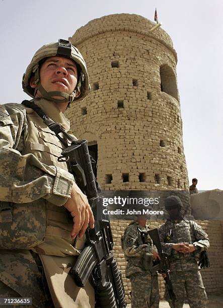 Army Sgt. Austin Gietzen, on Operation Mountain Thrust, looks towards Pakistan from the Afghan-Pakistan border crossing on June 19, 2006 in Spin...