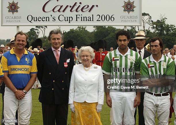 Arnaud Bamberger and Queen Elizabeth II attend The Queen's Cup final at the Guards Polo Club on June 18, 2006 in Windsor, England. The Surrey major...