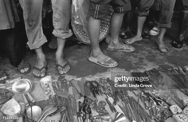 Metalware stall at Guilin market in China, circa 2000.