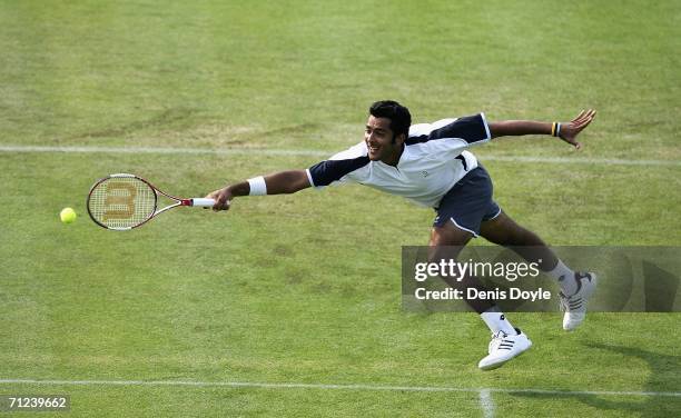 Aisam-Ul-Haq Qureshi of Pakistan failes to reach the ball during his first round tennis match against Mario Ancic of Croatia at the Ordina Open on...