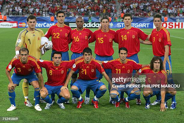 The Spanish team poses at the start of the opening round Group H World Cup football match between Spain and Tunisia at Stuttgart's Gottlieb-Daimler...
