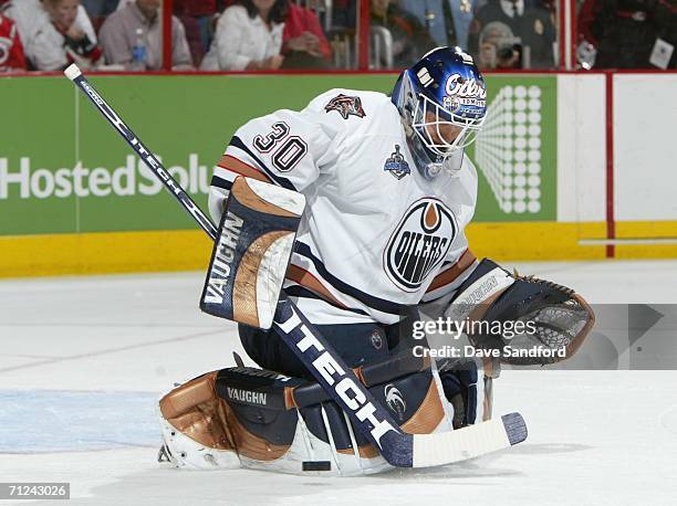 Goaltender Jussi Markkanen of the Edmonton Oilers makes a save on the shot from the Carolina Hurricanes during game seven of the 2006 NHL Stanley Cup...