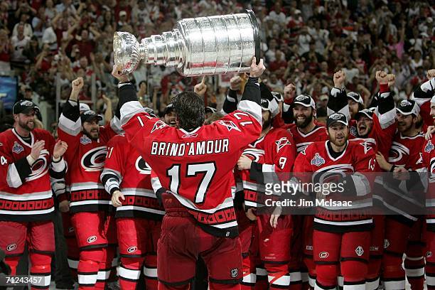 Rod Brind'Amour of the Carolina Hurricanes lifts the Stanley Cup after defeating the Edmonton Oilers in game seven of the 2006 NHL Stanley Cup Finals...