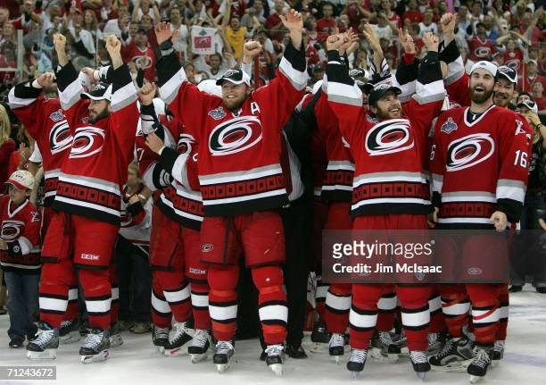 Mark Recchi, Kevyn Adams, Ray Whitney and Andrew Ladd of the Carolina Hurricanes celebrate after defeating the Edmonton Oilers in game seven of the...