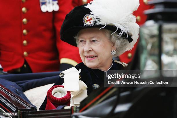 Queen Elizabeth ll leaves St George's Chapel in Windsor by carriage following the annual "Procession and Installation Service" of The Most Noble...