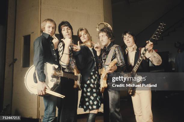 British rock group Wings pictured together at Abbey Road Studios to record the album, 'Venus And Mars', London, 15th November 1974. Left to right:...