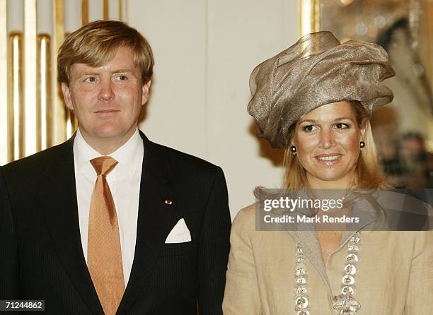 Dutch Crown Prince Willem Alexander and Princess Maxima pose for a photo at the Royal Palace during a 3-day visit on June 20, 2006 in Belgium,...